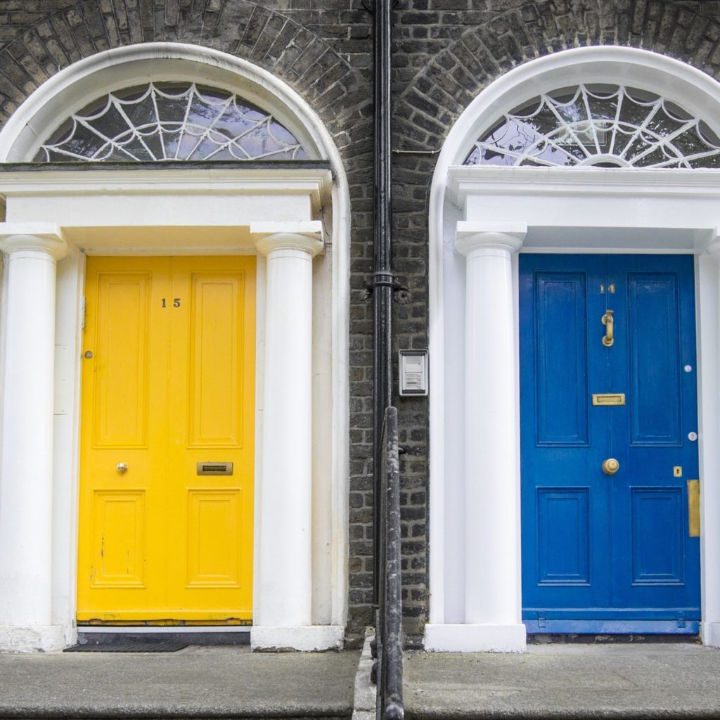 architectural-design-architecture-brick-wall-422844 Modern entrance doors still communicate to your guests. Discover what you might be saying!